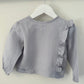 Bella ruffle button girls top