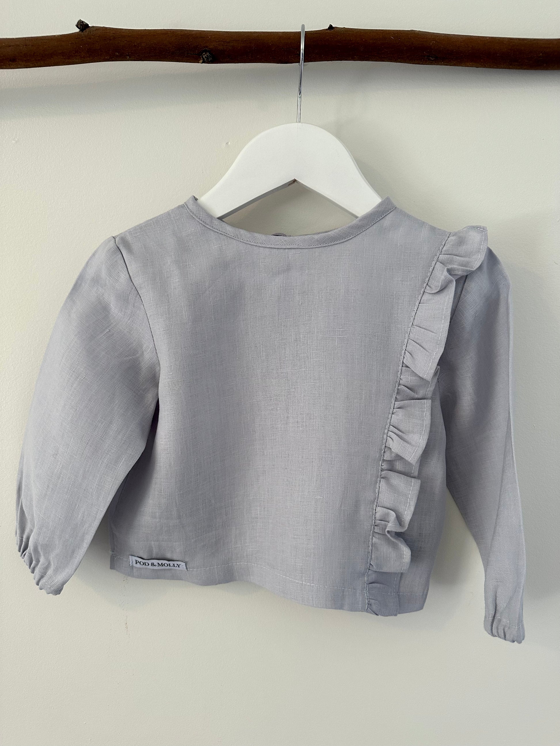 Bella ruffle button girls top