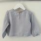 Bella ruffle girls top