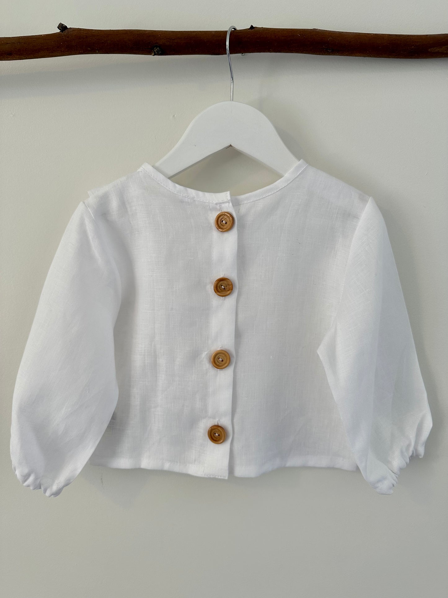 Bella ruffle button girls top