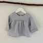 Lilly long sleeve top pale blue front